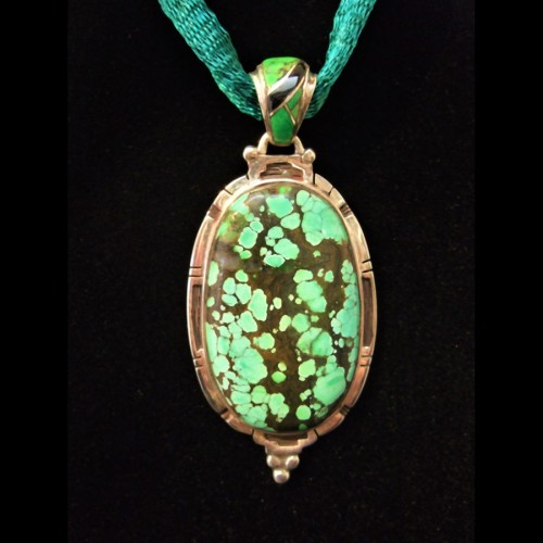 Turquoise Sterling Silver Pendant with inlaid bale